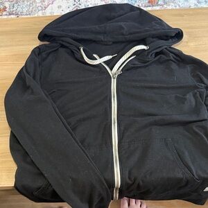 Vuori Black Hoodie with Cream Logo Patch
